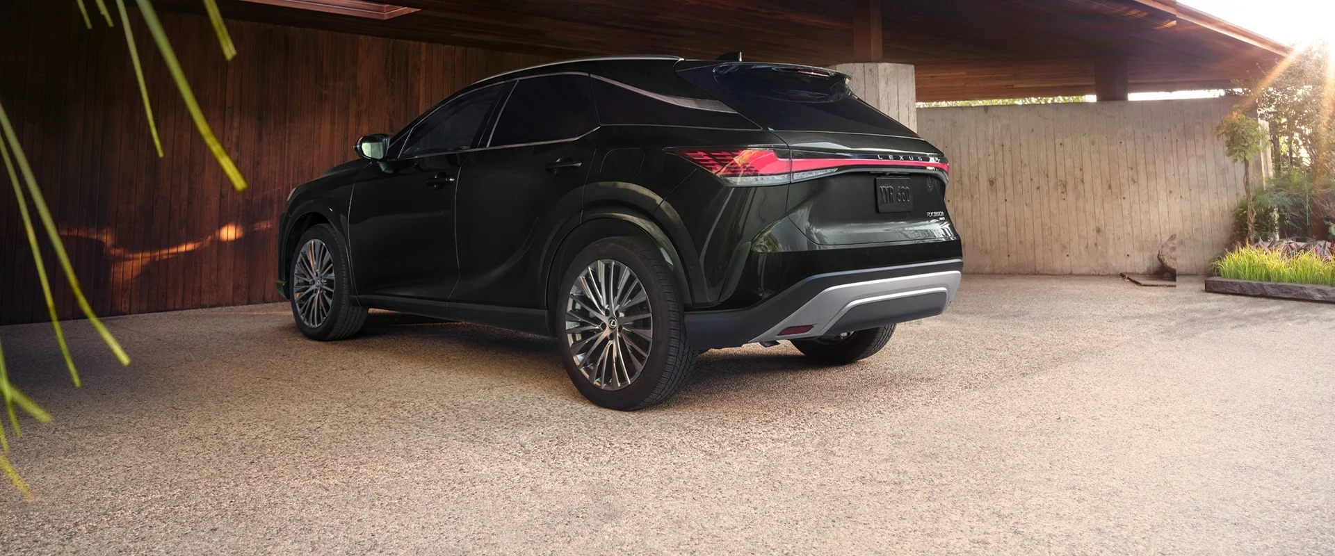 RX350 Hybrid Luxury all-wheel drive shown in Caviar exterior color.